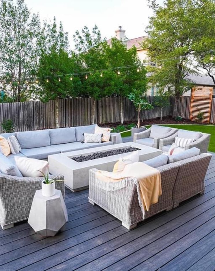 Bee Cave backyard deck and firepit screened from neighboring sightlines by a privacy fence
