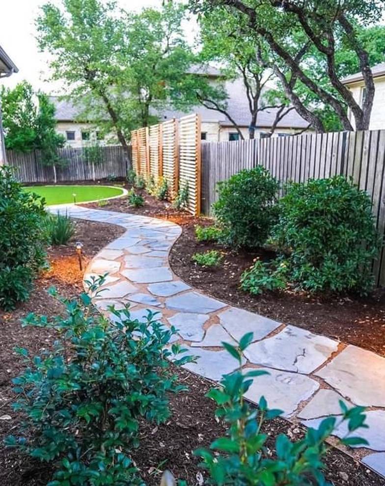 Bee Cave front yard with stone path and landscape lighting