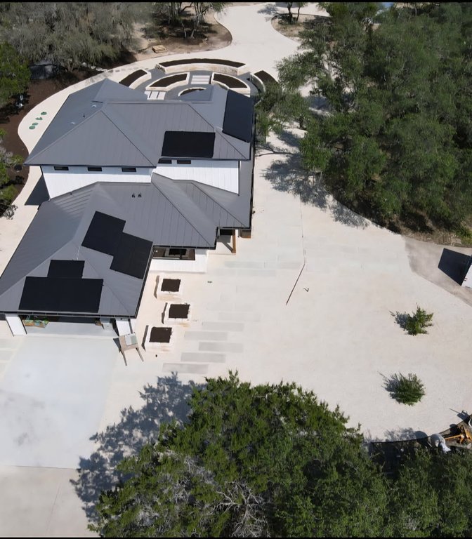 Phased landscape build-out at a Driftwood estate seen from above
