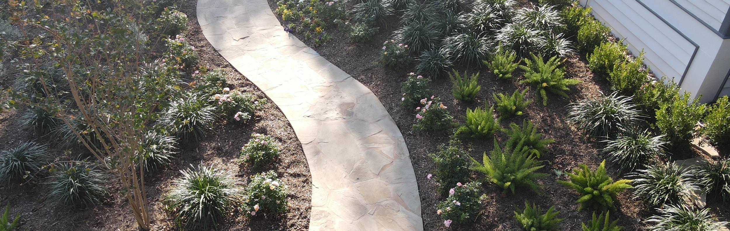 Steiner Ranch, TX home with landscape installation by Thrive Landscape and Design