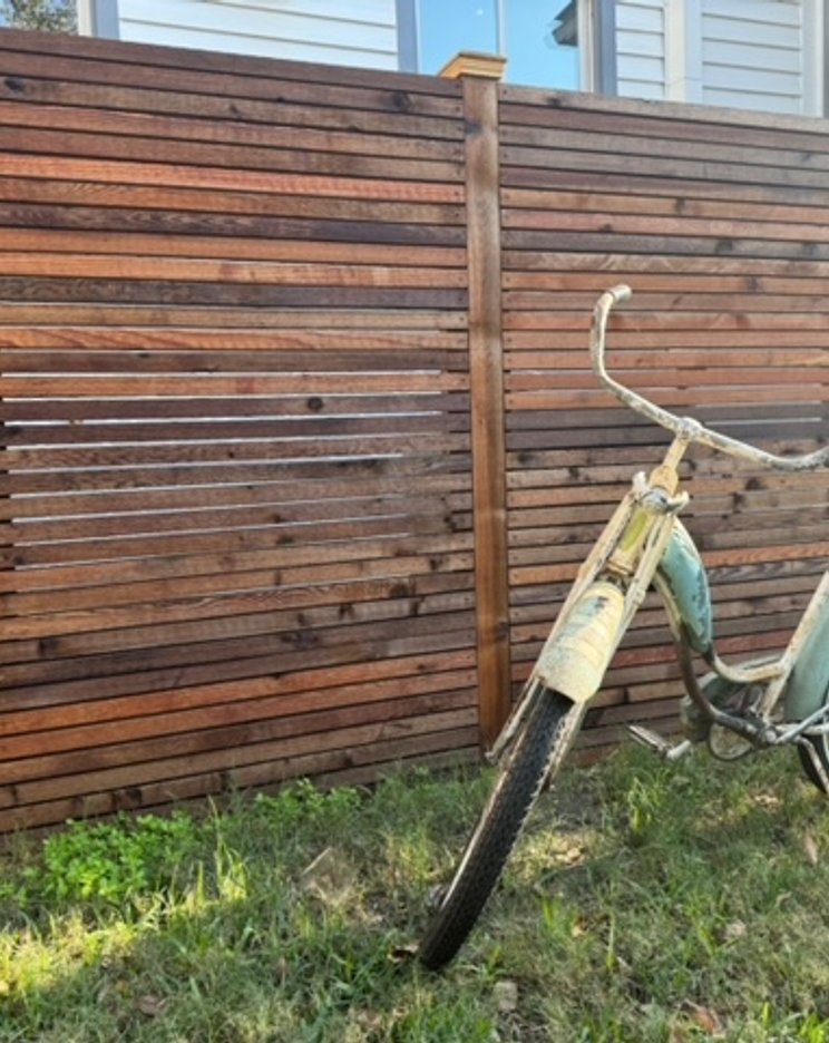 Wood fence running along a Fayetteville yard