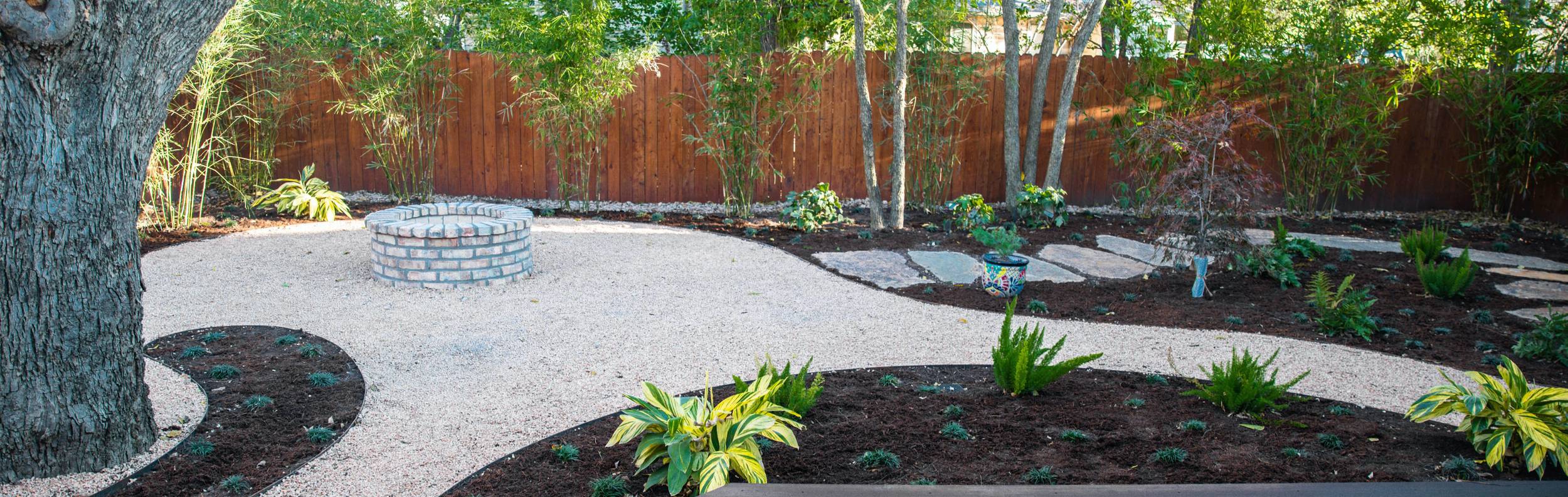 River Place, TX bluff home with landscape installation by Thrive Landscape and Design