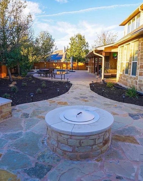 Steiner Ranch home entry with native plants and walkway lighting
