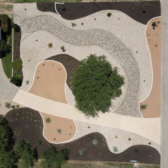 Mulched native beds in a Dripping Springs Hill Country xeriscape design
