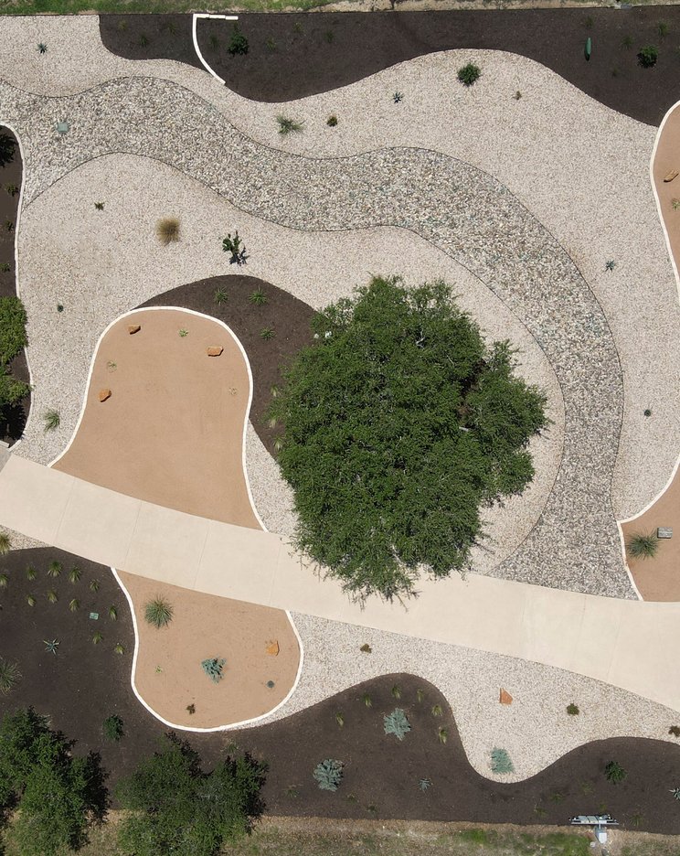 Dripping Springs Hill Country lot with a live oak awaiting a site plan
